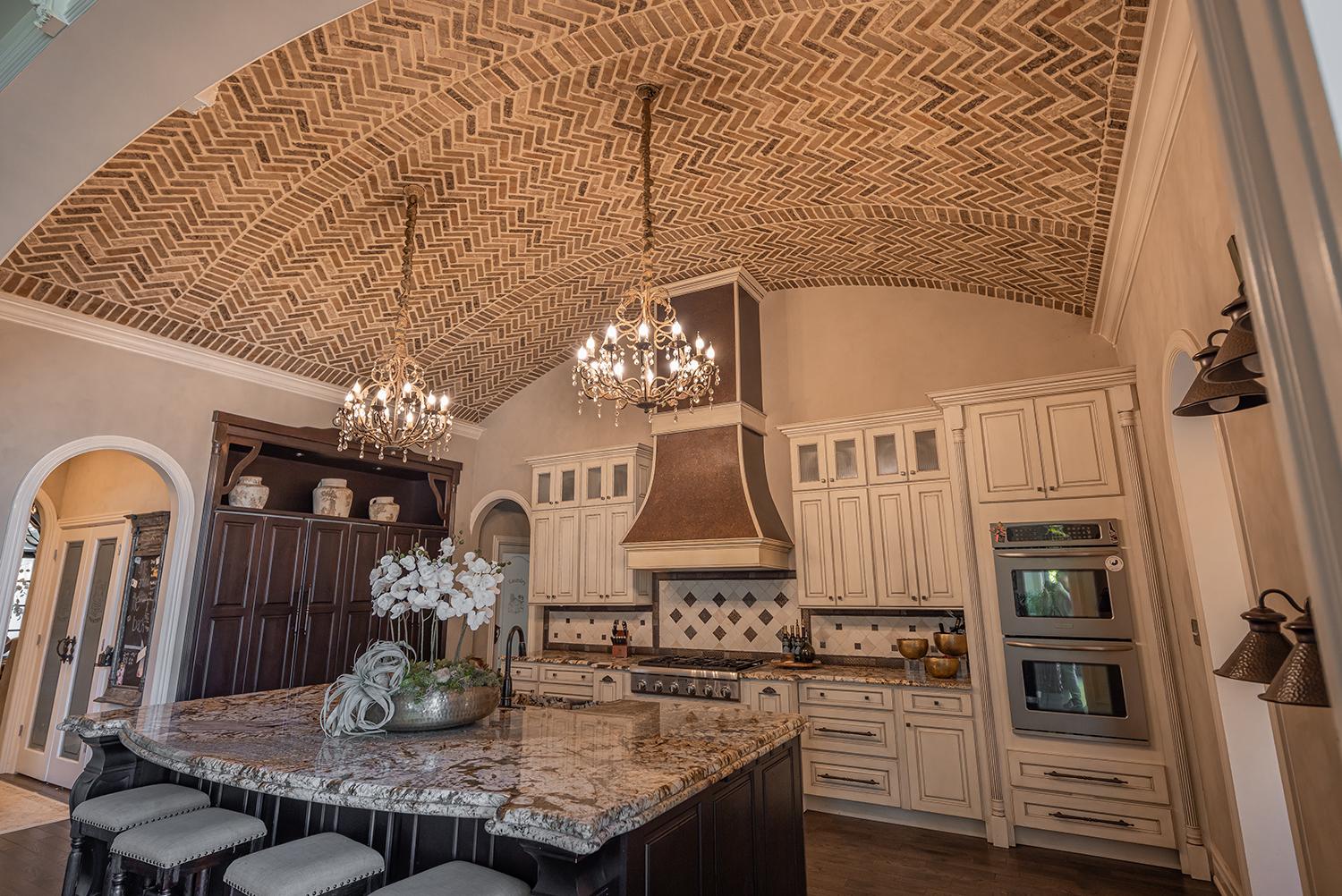 Thin brick installed on a canopy ceiling showcasing a warm, classic brick look